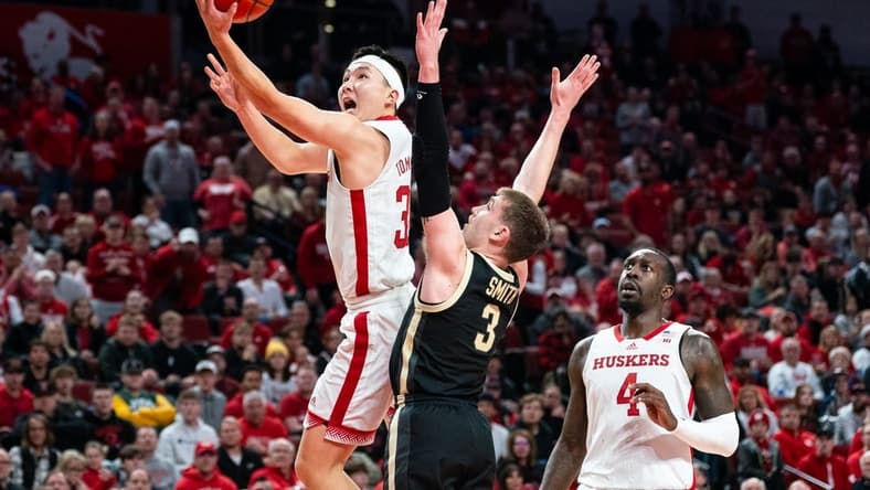 Jan 9, 2024; Lincoln, Nebraska, USA; Nebraska Cornhuskers guard Keisei Tominaga (30) shoots the ball against Purdue Boilermakers guard Braden Smith (3) during the first half at Pinnacle Bank Arena. Mandatory Credit: Dylan Widger-USA TODAY Sports
