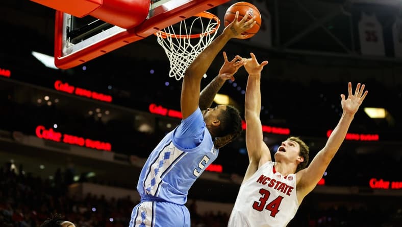 Jan 10, 2024; Raleigh, North Carolina, USA; North Carolina Tar Heels forward Armando Bacot (5) shoots the ball during the first half against North Carolina State Wolfpack at PNC Arena. Mandatory Credit: Jaylynn Nash-USA TODAY Sports