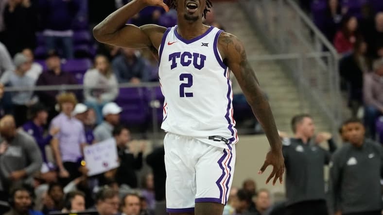 Jan 10, 2024; Fort Worth, Texas, USA; TCU Horned Frogs forward Emanuel Miller (2) celebrates after scoring against the Oklahoma Sooners during the second half at Ed and Rae Schollmaier Arena. Mandatory Credit: Chris Jones-USA TODAY Sports