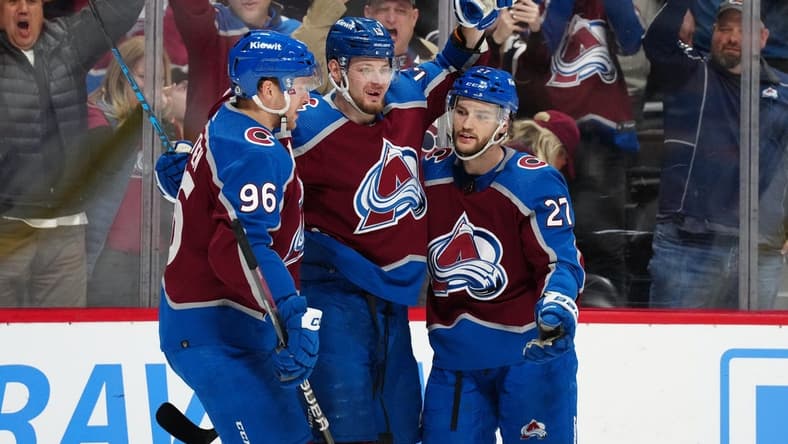 Jan 10, 2024; Denver, Colorado, USA; Colorado Avalanche right wing Valeri Nichushkin (13) celebrates his goal with right wing Mikko Rantanen (96) and left wing Jonathan Drouin (27) in the second period against the Vegas Golden Knights at Ball Arena. Mandatory Credit: Ron Chenoy-USA TODAY Sports