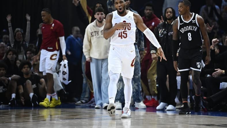 Jan 11, 2024; Paris, FRANCE; Cleveland Cavaliers guard Donovan Mitchell (45) celebrates a three pointer against the Brooklyn Nets in the NBA Paris Game at AccorHotels Arena. Mandatory Credit: Alexis Reau/Presse Sports via USA TODAY Sports