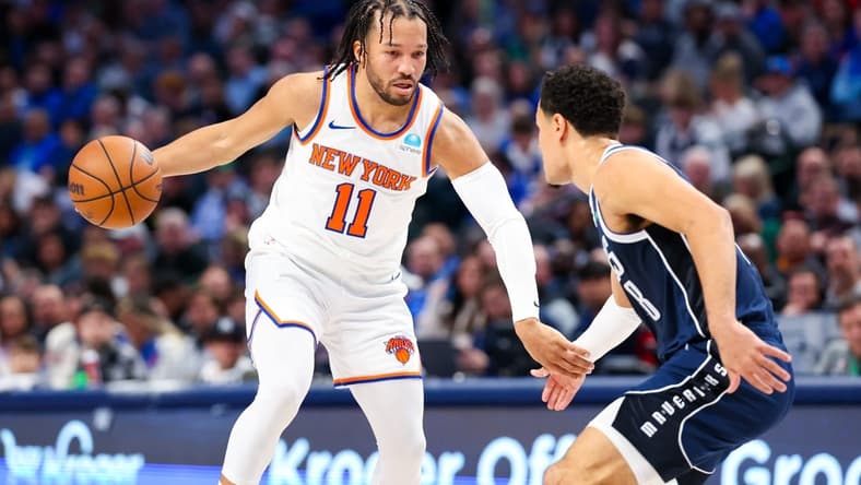 Jan 11, 2024; Dallas, Texas, USA; New York Knicks guard Jalen Brunson (11) dribbles as Dallas Mavericks guard Josh Green (8) defends during the first half at American Airlines Center. Mandatory Credit: Kevin Jairaj-USA TODAY Sports