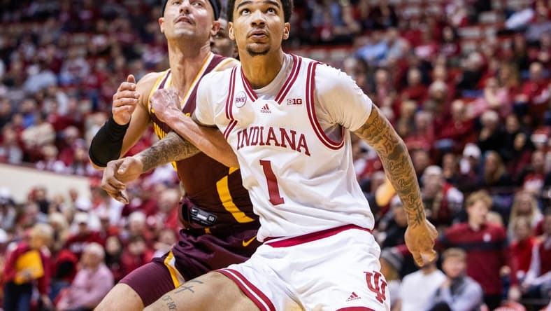 Jan 12, 2024; Bloomington, Indiana, USA; Indiana Hoosiers center Kel'el Ware (1) boxes out Minnesota Golden Gophers forward Dawson Garcia (3) in the second half at Simon Skjodt Assembly Hall. Mandatory Credit: Trevor Ruszkowski-USA TODAY Sports