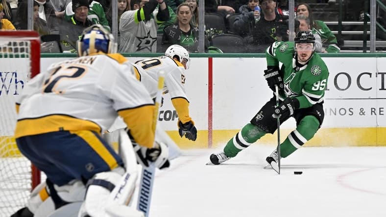 Jan 12, 2024; Dallas, Texas, USA; Nashville Predators goaltender Kevin Lankinen (32) faces a shot by Dallas Stars center Matt Duchene (95) during the second period at the American Airlines Center. Mandatory Credit: Jerome Miron-USA TODAY Sports