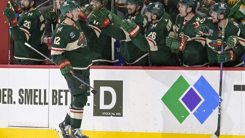 Jan 12, 2024; Saint Paul, Minnesota, USA; Minnesota Wild forward Matt Boldy (12) celebrates his goal against the Philadelphia Flyers during the third period at Xcel Energy Center. Mandatory Credit: Nick Wosika-USA TODAY Sports
