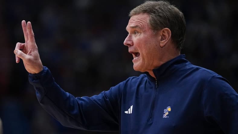 Jan 13, 2024; Lawrence, Kansas, USA; Kansas Jayhawks head coach Bill Self calls a play during the first half against the Oklahoma Sooners at Allen Fieldhouse. Mandatory Credit: Jay Biggerstaff-USA TODAY Sports