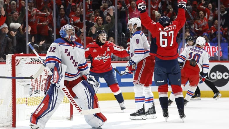 Jan 13, 2024; Washington, District of Columbia, USA; Washington Capitals right wing T.J. Oshie (77) celebrates with Capitals left wing Max Pacioretty (67) after scoring a goal on New York Rangers goaltender Jonathan Quick (32) in the third period at Capital One Arena. Mandatory Credit: Geoff Burke-USA TODAY Sports