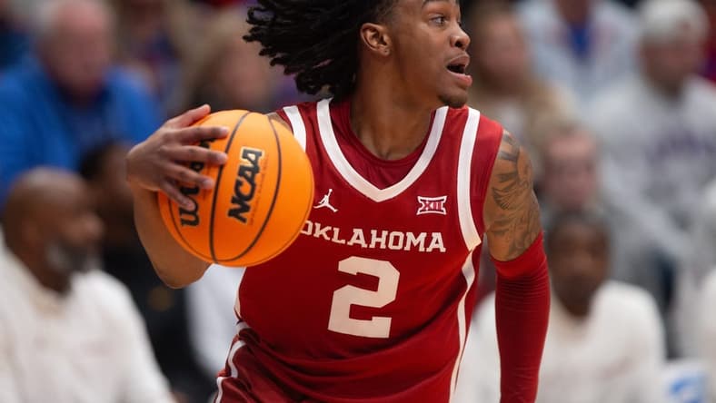 Oklahoma junior guard Javian McCollum (2) returns the ball after a Kansas basket in the first half of the game Saturday, Jan. 13, 2024, inside Allen Fieldhouse.