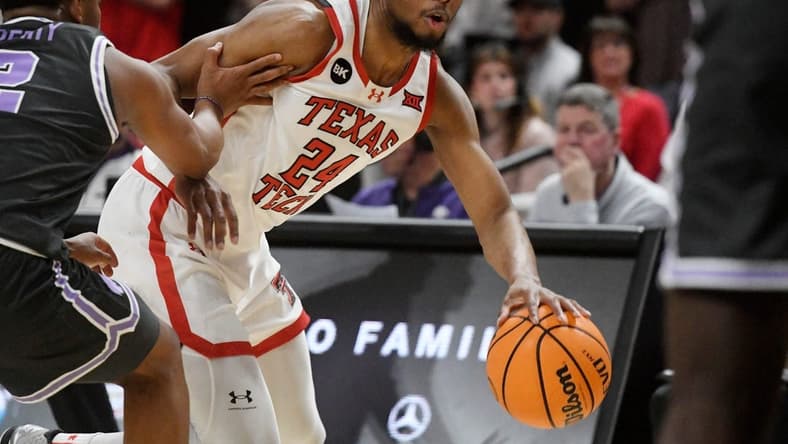 Texas Tech's guard Kerwin Walton (24) dribbles the ball against Kansas State in a Big 12 basketball game, Saturday, Jan.13, 2024, at United Supermarkets Arena.