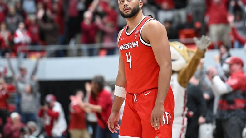 Jan 13, 2024; Pullman, Washington, USA; Arizona Wildcats guard Kylan Boswell (4) looks up at the score board after a game against the Washington State Cougars at Friel Court at Beasley Coliseum. Washington State won 73-70. Mandatory Credit: James Snook-USA TODAY Sports