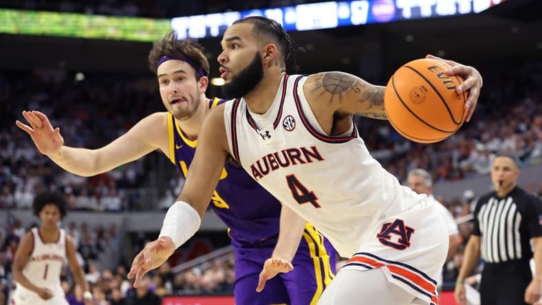 Jan 13, 2024; Auburn, Alabama, USA; Auburn Tigers forward Johni Broome (4) drives to the goal during the second half against the LSU Tigers at Neville Arena. Mandatory Credit: John Reed-USA TODAY Sports