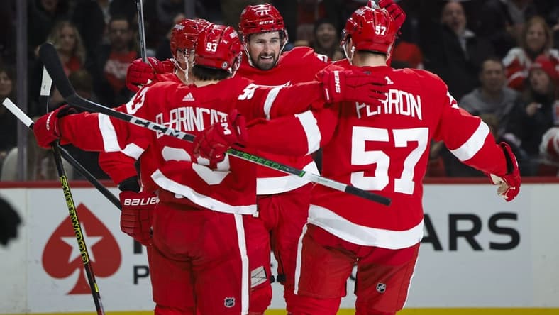 Jan 13, 2024; Detroit, Michigan, USA; Detroit Red Wings center Dylan Larkin (71) celebrates after he scores a goal on Los Angeles Kings goaltender Cam Talbot (39) in the second period at Little Caesars Arena. Mandatory Credit: Rick Osentoski-USA TODAY Sports