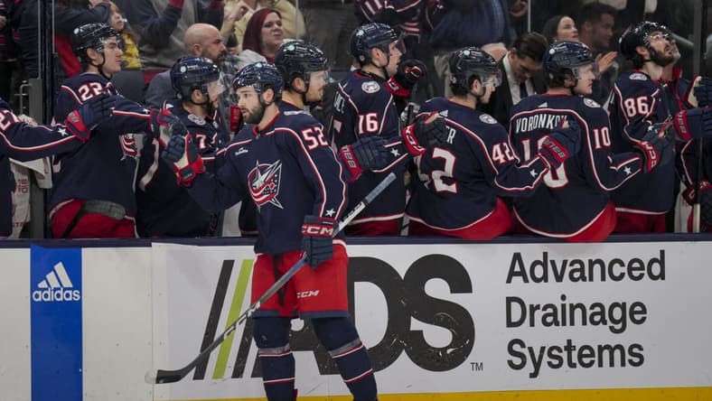 cJan 13, 2024; Columbus, Ohio, USA;  Columbus Blue Jackets right wing Emil Bemstrom (52) celebrates with teammates on the bench after scoring a goal against the Seattle Kraken in the third period at Nationwide Arena. Mandatory Credit: Aaron Doster-USA TODAY Sports