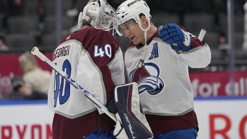 Jan 13, 2024; Toronto, Ontario, CAN; Colorado Avalanche forward Nathan MacKinnon (29) and goaltender Alexandar Georgiev (40) celebrate a win over the Toronto Maple Leafs during the third period at Scotiabank Arena. Mandatory Credit: John E. Sokolowski-USA TODAY Sports