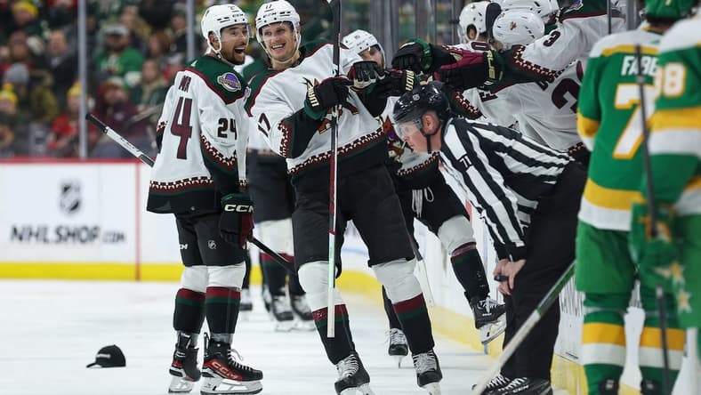 Jan 13, 2024; Saint Paul, Minnesota, USA; Arizona Coyotes center Nick Bjugstad (17) celebrates his hat-trick against the Minnesota Wild during the second period at Xcel Energy Center. Mandatory Credit: Matt Krohn-USA TODAY Sports