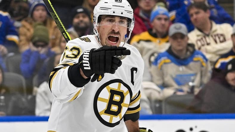 Jan 13, 2024; St. Louis, Missouri, USA; Boston Bruins left wing Brad Marchand (63) reacts after scoring against the St. Louis Blues during the third period at Enterprise Center. Mandatory Credit: Jeff Curry-USA TODAY Sports