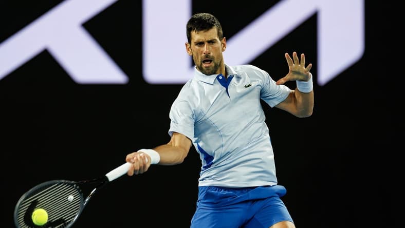 Jan 14, 2024; Melbourne, Victoria, Australia; Novak Djokovic of Serbia hits a shot against Dino Prizmic of Croatia in the first round of the men s singles. Mandatory Credit: Mike Frey-USA TODAY Sports