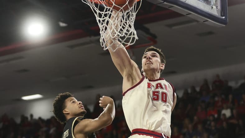 Jan 14, 2024; Boca Raton, Florida, USA; Florida Atlantic Owls center Vladislav Goldin (50) dunks the basketball against the UAB Blazers during the second half at Eleanor R. Baldwin Arena. Mandatory Credit: Sam Navarro-USA TODAY Sports