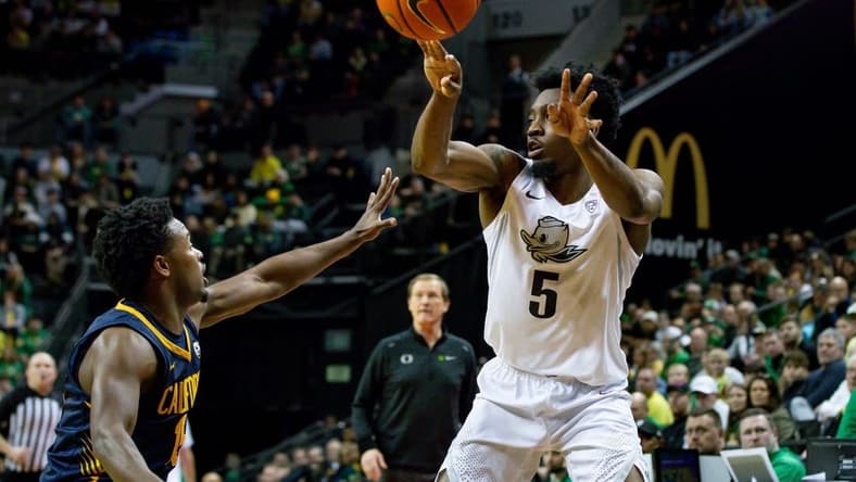 Oregon guard Jermaine Couisnard shoots as the Oregon Ducks host the California Golden Bears Saturday, Jan. 13, 2024 at Matthew Knight Arena in Eugene, Ore.
