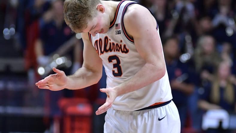 Jan 14, 2024; Champaign, Illinois, USA;  Illinois Fighting Illini guard Marcus Domask (3) slaps his hands after a turnover during the second half against the Maryland Terrapins at State Farm Center. Mandatory Credit: Ron Johnson-USA TODAY Sports
