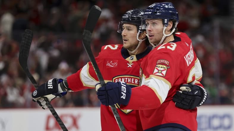 Jan 15, 2024; Sunrise, Florida, USA; Florida Panthers center Carter Verhaeghe (23) celebrates with center Sam Reinhart (13) after scoring against the Anaheim Ducks during the second period at Amerant Bank Arena. Mandatory Credit: Sam Navarro-USA TODAY Sports