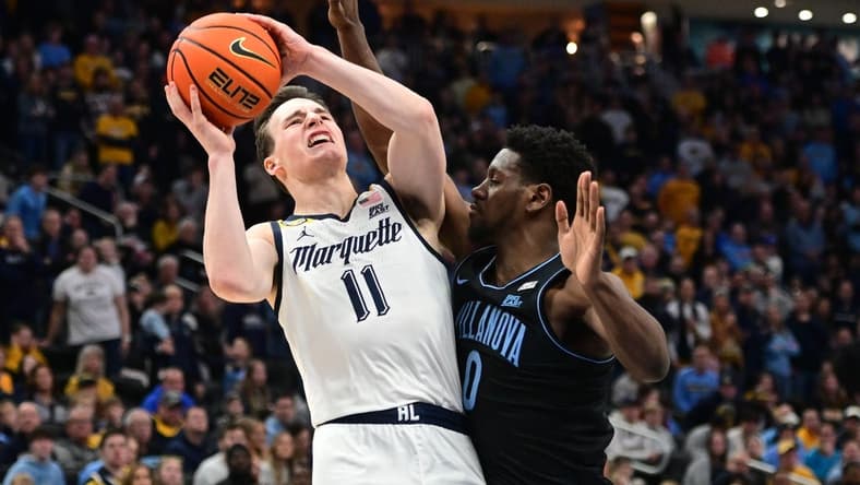 Jan 15, 2024; Milwaukee, Wisconsin, USA; Marquette Golden Eagles guard Tyler Kolek (11) takes a shot against Villanova Wildcats guard TJ Bamba (0) in the second half at Fiserv Forum. Mandatory Credit: Benny Sieu-USA TODAY Sports