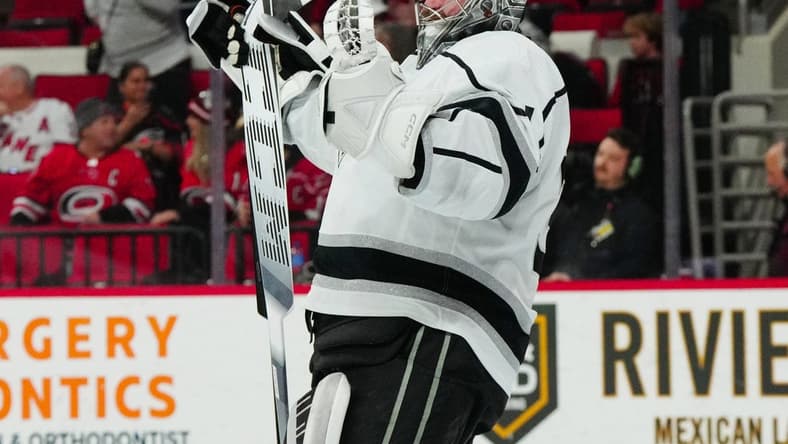 Jan 15, 2024; Raleigh, North Carolina, USA; Los Angeles Kings goaltender David Rittich (31) celebrates his victory against the Carolina Hurricanes at PNC Arena. Mandatory Credit: James Guillory-USA TODAY Sports