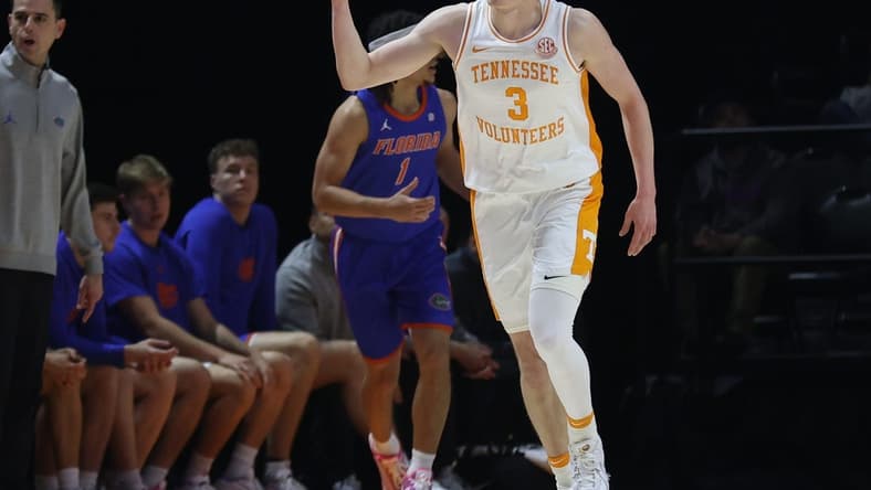 Jan 16, 2024; Knoxville, Tennessee, USA; Tennessee Volunteers guard Dalton Knecht (3) reacts after shooting a three pointer against the Florida Gators during the first half at Thompson-Boling Arena at Food City Center. Mandatory Credit: Randy Sartin-USA TODAY Sports