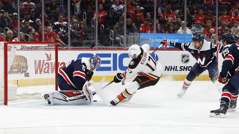 Jan 16, 2024; Washington, District of Columbia, USA; Anaheim Ducks left wing Alex Killorn (17) skates in on Washington Capitals goaltender Darcy Kuemper (35) as Capitals center Evgeny Kuznetsov (92) defends in the second period at Capital One Arena. Mandatory Credit: Geoff Burke-USA TODAY Sports