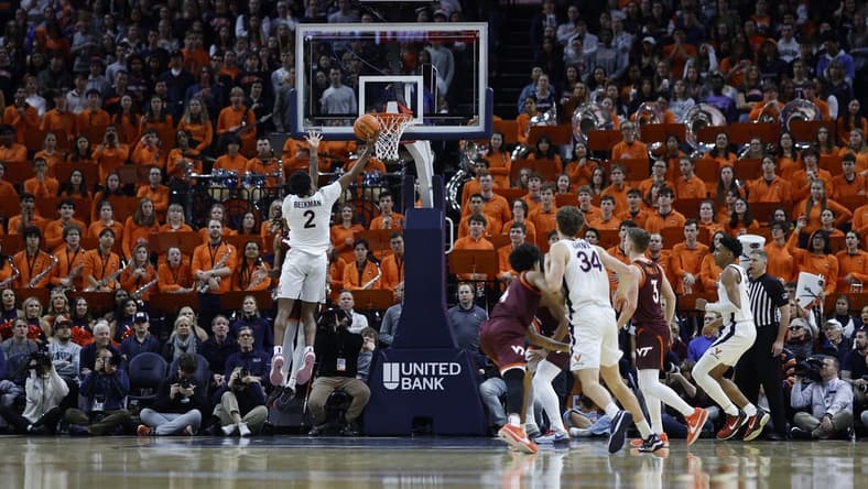 Jan 17, 2024; Charlottesville, Virginia, USA; Virginia Cavaliers guard Reece Beekman (2) shoots the ball against the Virginia Tech Hokies in the first half at John Paul Jones Arena. Mandatory Credit: Geoff Burke-USA TODAY Sports