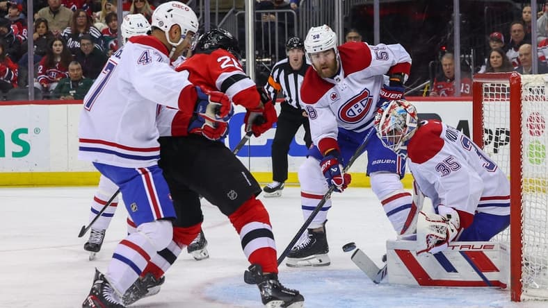 Jan 17, 2024; Newark, New Jersey, USA; Montreal Canadiens goaltender Sam Montembeault (35) makes a save against the New Jersey Devils during the second period at Prudential Center. Mandatory Credit: Ed Mulholland-USA TODAY Sports