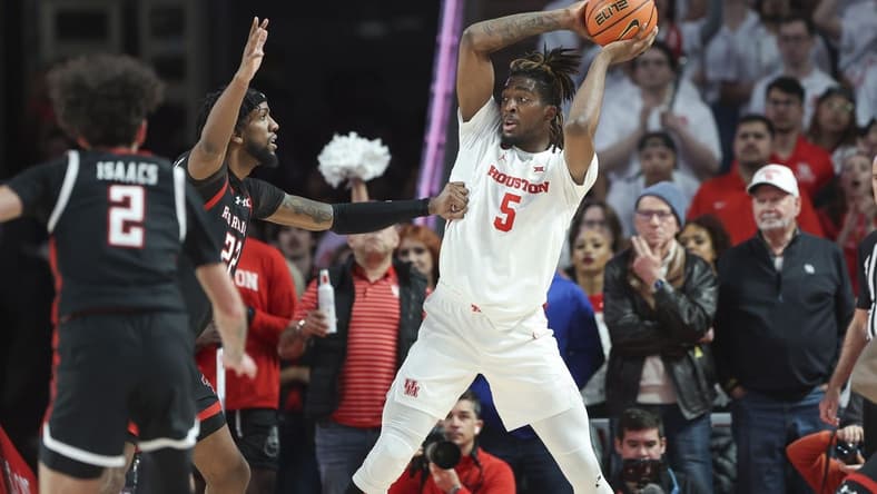 Jan 17, 2024; Houston, Texas, USA; Houston Cougars forward Ja'Vier Francis (5) controls the ball during the first half against the Texas Tech Red Raiders at Fertitta Center. Mandatory Credit: Troy Taormina-USA TODAY Sports
