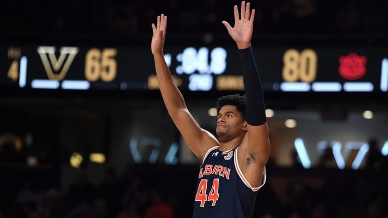 Jan 17, 2024; Nashville, Tennessee, USA; Auburn Tigers center Dylan Cardwell (44) celebrates in the closing seconds of the second half of a win against the Vanderbilt Commodores at Memorial Gymnasium. Mandatory Credit: Christopher Hanewinckel-USA TODAY Sports