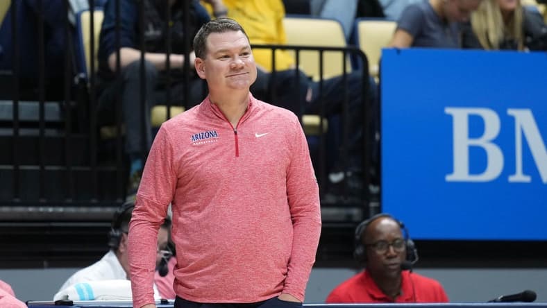 Dec 29, 2023; Berkeley, California, USA; Arizona Wildcats head coach Tommy Lloyd stands in front of the bench during the second half against the California Golden Bears at Haas Pavilion. Mandatory Credit: Darren Yamashita-USA TODAY Sports