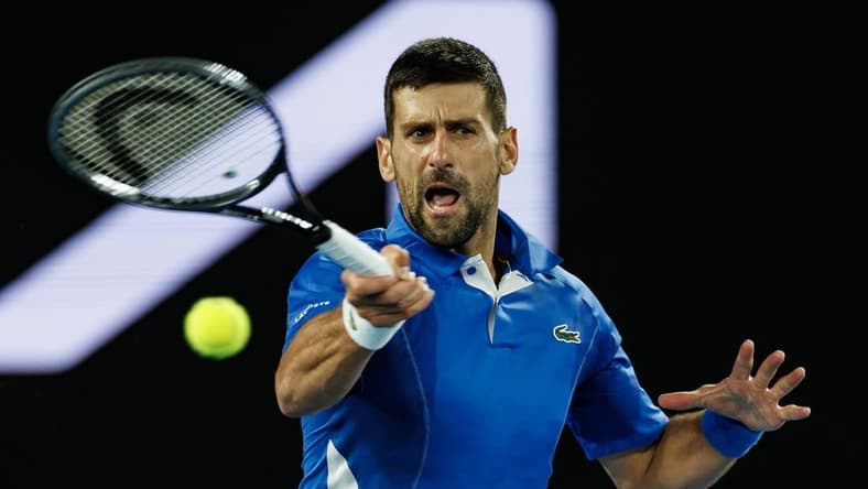Jan 17, 2024; Melbourne, Victoria, Australia; Novak Djokovic Serbia plays a shot against Alexei Popyrin (not pictured) of Australia in Round 2 of the Men's Singles on Day 4 of the Australian Open tennis at Rod Laver Arena. Mandatory Credit: Mike Frey-USA TODAY Sports