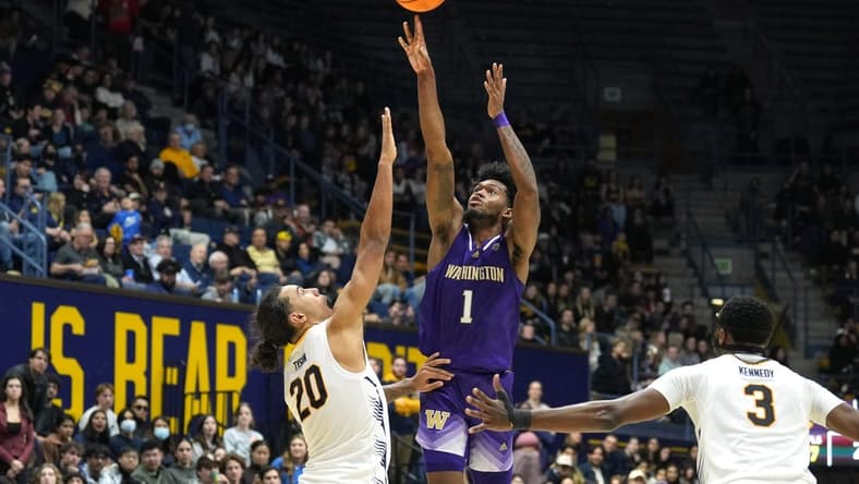 Jan 18, 2024; Berkeley, California, USA; Washington Huskies forward Keion Brooks Jr. (1) shoots against California Golden Bears guard Jaylon Tyson (20) during the first half at Haas Pavilion. Mandatory Credit: Darren Yamashita-USA TODAY Sports