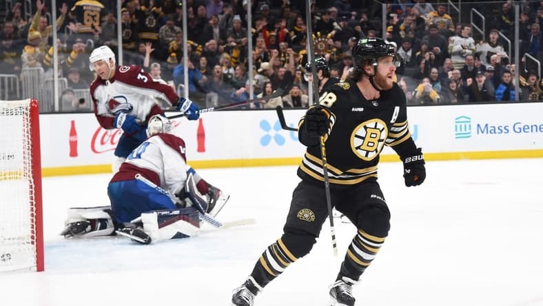 Jan 18, 2024; Boston, Massachusetts, USA; Boston Bruins right wing David Pastrnak (88) reacts after scoring a goal during the third period against the Colorado Avalanche at TD Garden. Mandatory Credit: Bob DeChiara-USA TODAY Sports