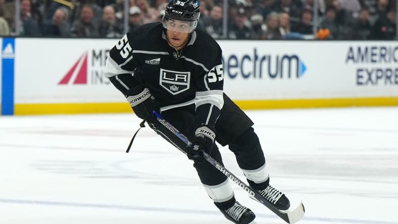Jan 18, 2024; Los Angeles, California, USA; LA Kings right wing Quinton Byfield (55) skates with the puck against the Nashville Predators in the second period at Crypto.com Arena. Mandatory Credit: Kirby Lee-USA TODAY Sports
