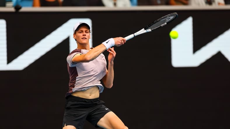 Jan 19, 2024; Melbourne, Victoria, Australia; Jannik Sinner of Italy plays a shot against Sebastian Baez (not pictured) of Argentina in Round 3 of the Men's Singles on Day 6 of the Australian Open tennis at Margaret Court Arena. Mandatory Credit: Mike Frey-USA TODAY Sports