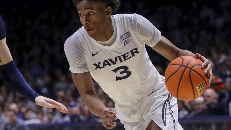 Jan 19, 2024; Cincinnati, Ohio, USA; Xavier Musketeers guard Dailyn Swain (3) dribbles against the Georgetown Hoyas in the first half at Cintas Center. Mandatory Credit: Katie Stratman-USA TODAY Sports