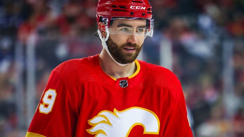 Jan 18, 2024; Calgary, Alberta, CAN; Calgary Flames center Dillon Dube (29) against the Toronto Maple Leafs during the first period at Scotiabank Saddledome. Mandatory Credit: Sergei Belski-USA TODAY Sports