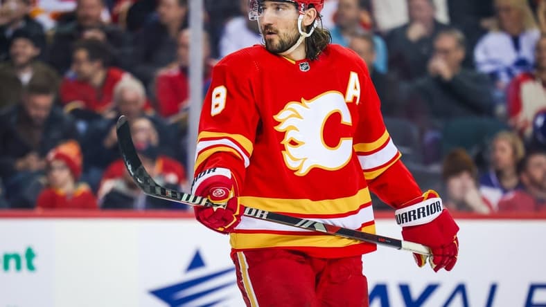 Jan 18, 2024; Calgary, Alberta, CAN; Calgary Flames defenseman Chris Tanev (8) against the Toronto Maple Leafs during the second period at Scotiabank Saddledome. Mandatory Credit: Sergei Belski-USA TODAY Sports