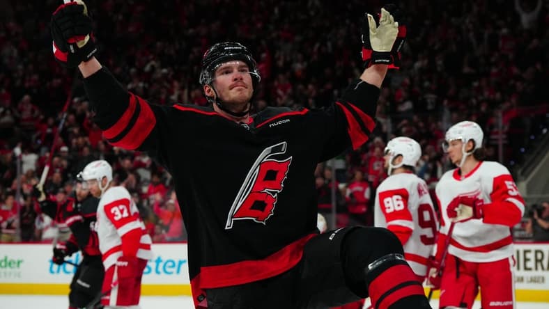 Jan 19, 2024; Raleigh, North Carolina, USA; Carolina Hurricanes right wing Andrei Svechnikov (37) scores a goal against the Detroit Red Wings during the third period at PNC Arena. Mandatory Credit: James Guillory-USA TODAY Sports