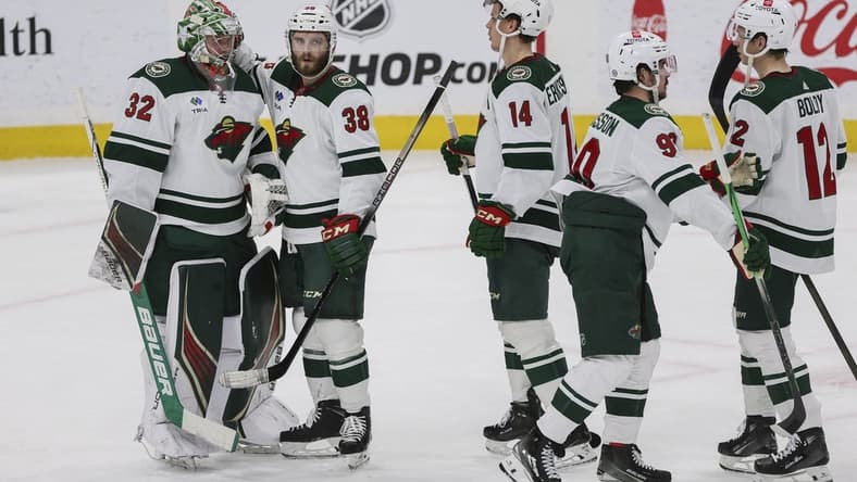Jan 19, 2024; Sunrise, Florida, USA; Minnesota Wild goaltender Filip Gustavsson (32) celebrates with right wing Ryan Hartman (38), center Joel Eriksson Ek (14), Minnesota Wild left wing Marcus Johansson (90) and left wing Matt Boldy (12) after winning the game against the Florida Panthers at Amerant Bank Arena. Mandatory Credit: Sam Navarro-USA TODAY Sports