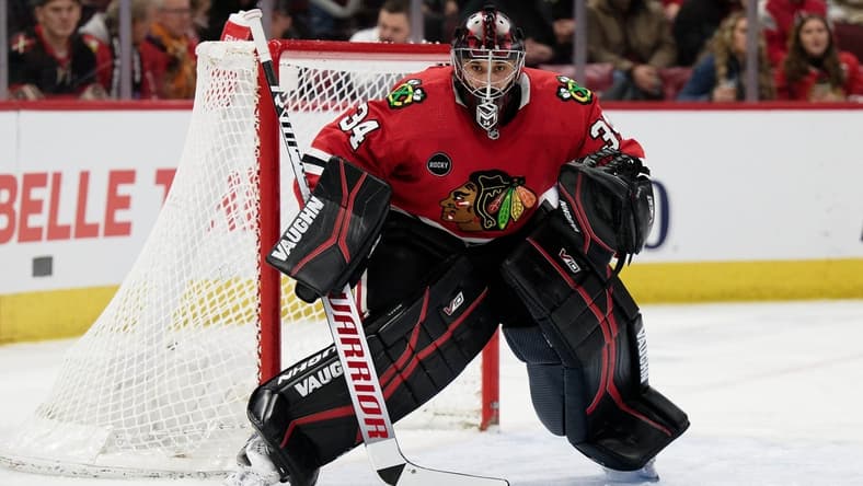 Jan 13, 2024; Chicago, Illinois, USA; Chicago Blackhawks goaltender Petr Mrazek (34) defends the net against the Dallas Stars at United Center. Mandatory Credit: Jamie Sabau-USA TODAY Sports
