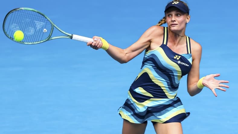 Jan 20, 2024; Melbourne, Victoria, Australia; Dayana Yastremska of Ukraine plays a shot against Emma Navarro (not pictured) of the United States in Round 3 of the Women's Singles on Day 6 of the Australian Open tennis at John Cain Arena. Mandatory Credit: Mike Frey-USA TODAY Sports