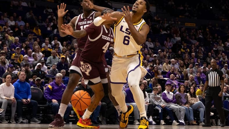 Jan 20, 2024; Baton Rouge, Louisiana, USA;  Texas A&M Aggies guard Wade Taylor IV (4) blocks the shot of LSU Tigers guard Jordan Wright (6) during the first half at Pete Maravich Assembly Center. Mandatory Credit: Stephen Lew-USA TODAY Sports
