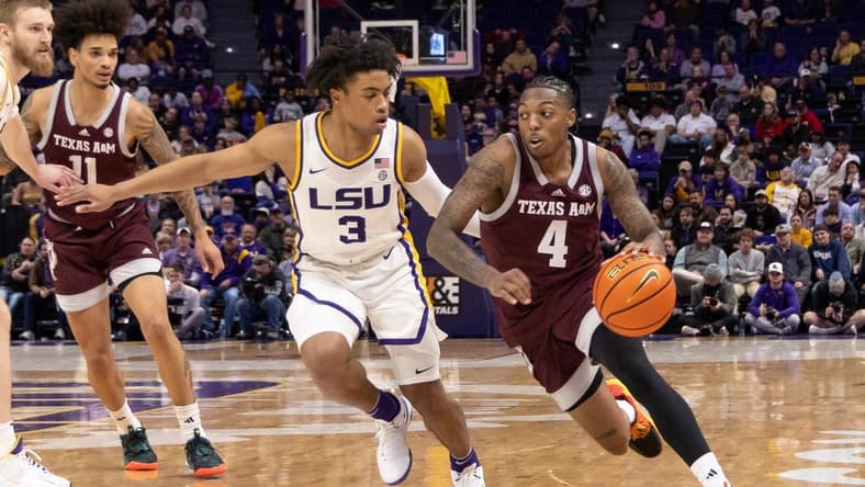 Jan 20, 2024; Baton Rouge, Louisiana, USA;  Texas A&M Aggies guard Wade Taylor IV (4) dribbles against LSU Tigers guard Jalen Cook (3) during the second half at Pete Maravich Assembly Center. Mandatory Credit: Stephen Lew-USA TODAY Sports