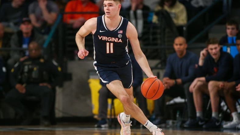 Jan 20, 2024; Atlanta, Georgia, USA; Virginia Cavaliers guard Isaac McKneely (11) dribbles against the Georgia Tech Yellow Jackets in the second half at McCamish Pavilion. Mandatory Credit: Brett Davis-USA TODAY Sports