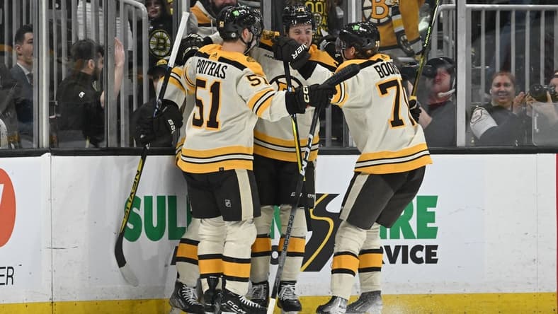 Jan 20, 2024; Boston, Massachusetts, USA; Boston Bruins left wing Danton Heinen (43) celebrates with his teammates after a goal against the Montreal Canadiens during the second period at the TD Garden. Mandatory Credit: Brian Fluharty-USA TODAY Sports